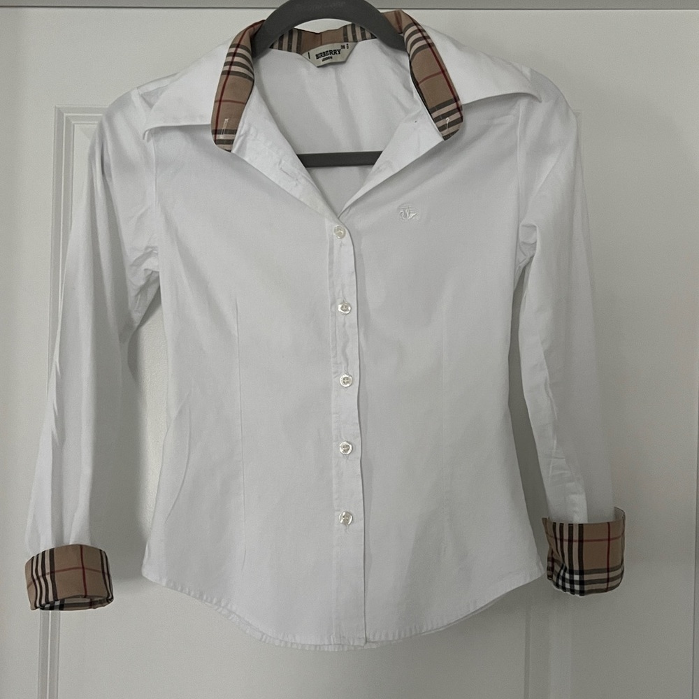 Authentic Burberry button down in slim tailored fit.